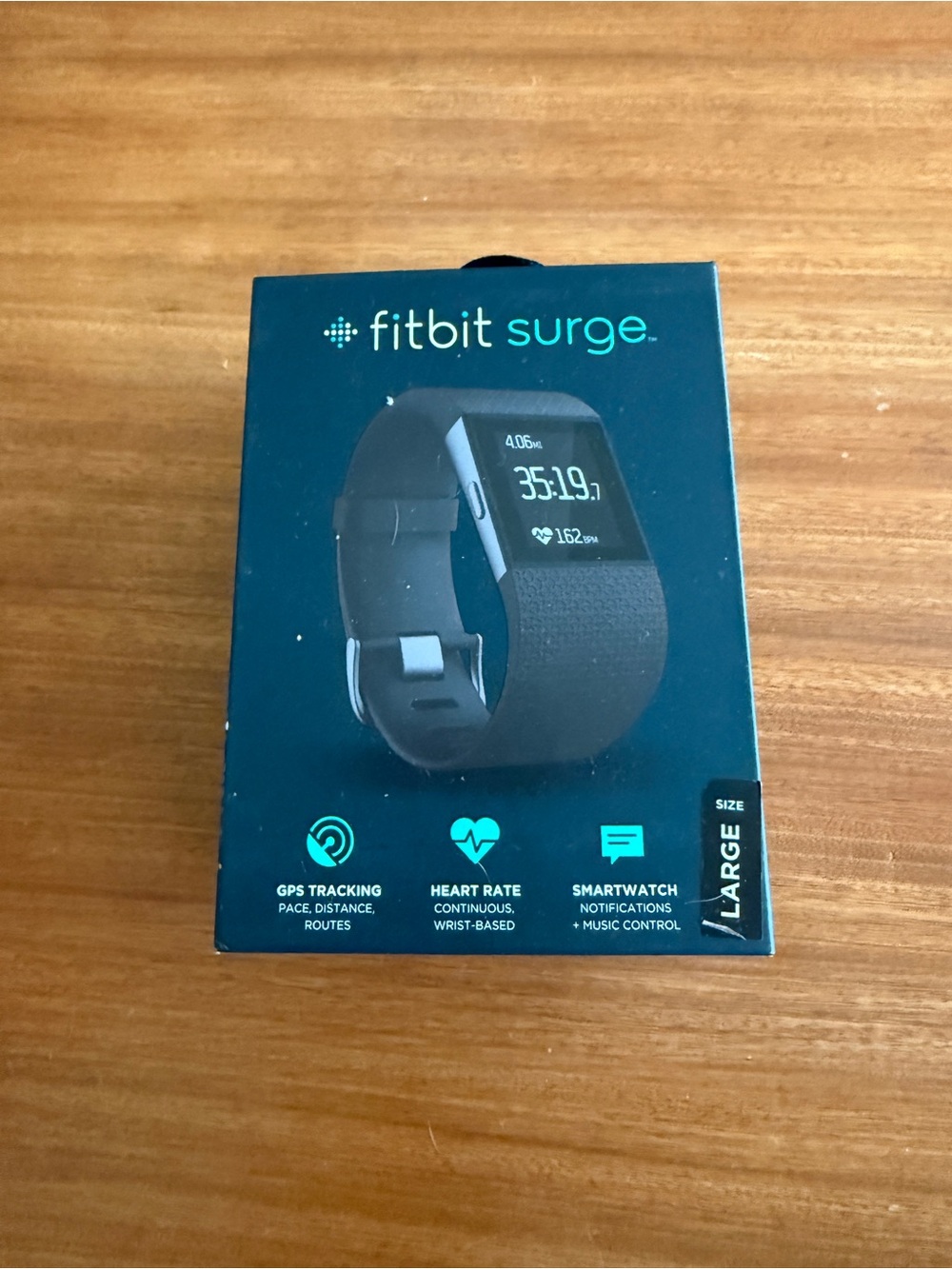 fitbit surge smartwatch in black with black band